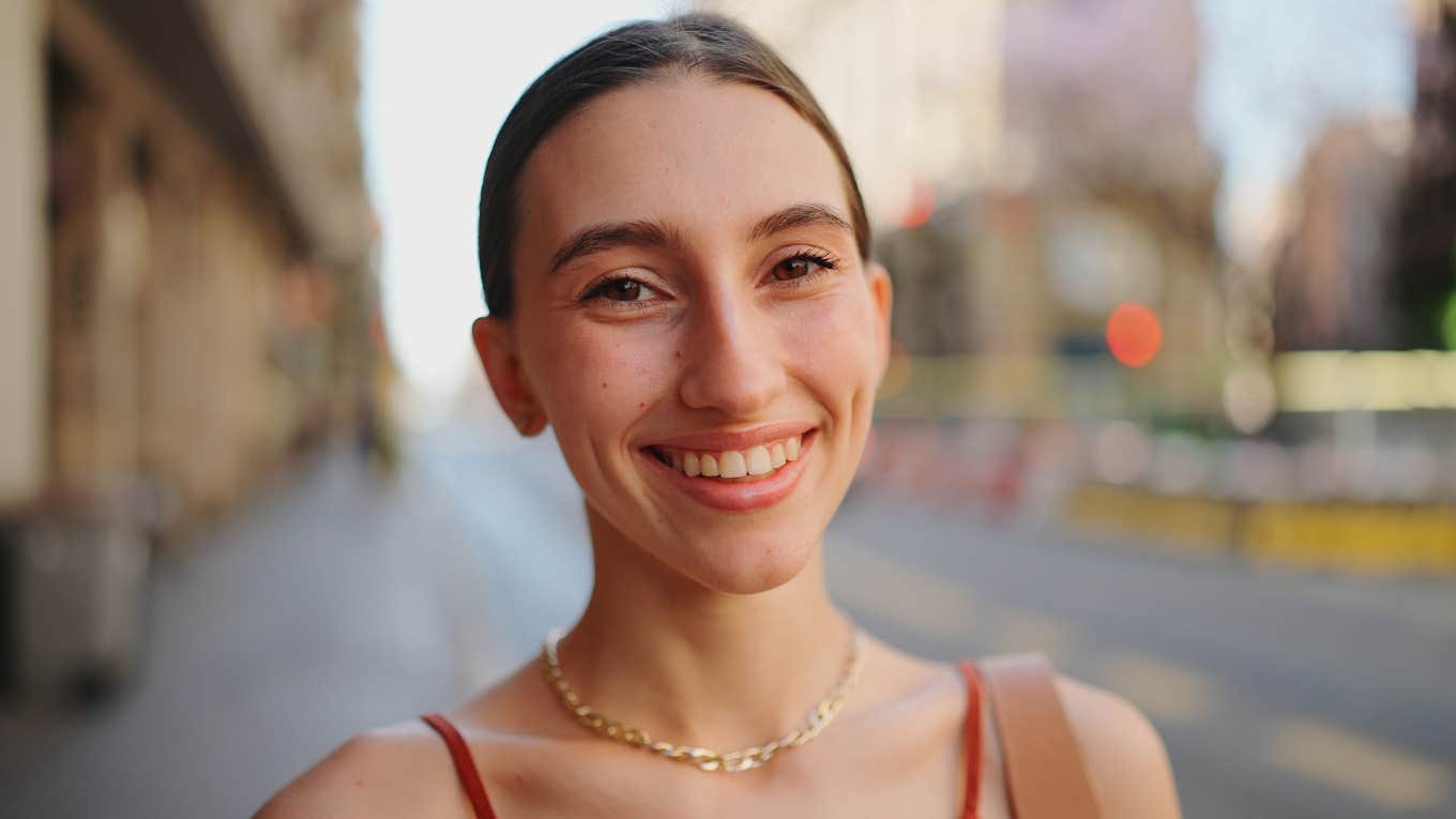 happy woman smiling about to change her life