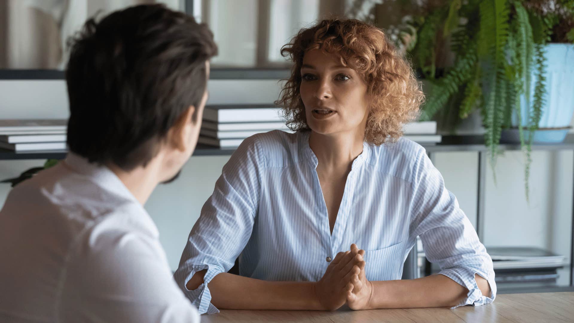 woman being assertive to man in a respectful way