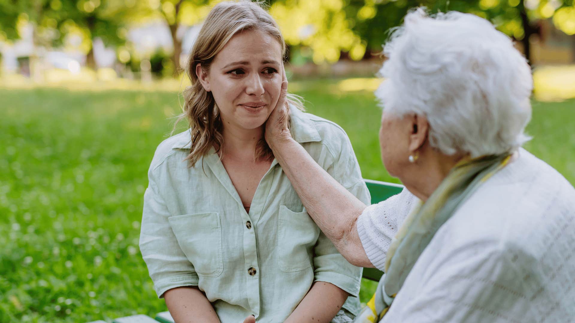 introvert woman crying to her grandmother