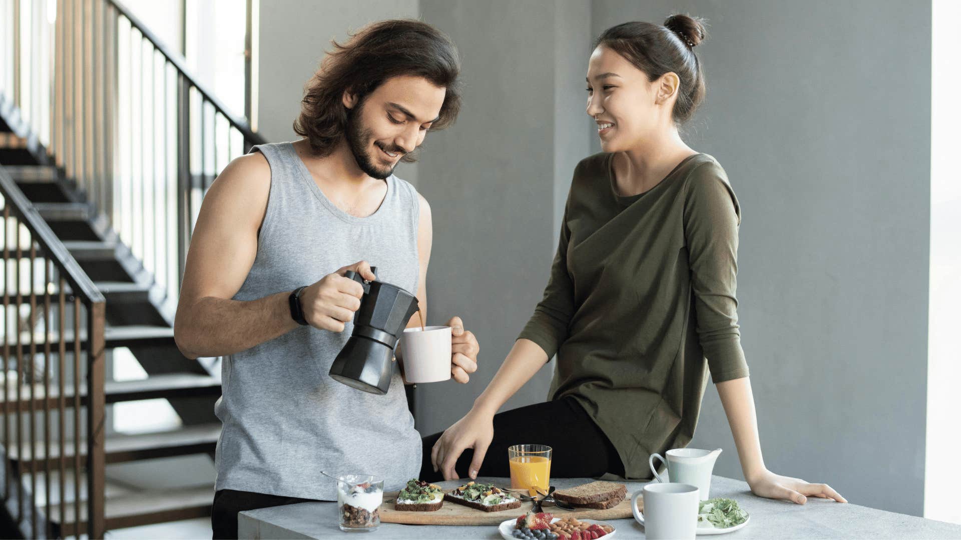 couple being positive making breakfast