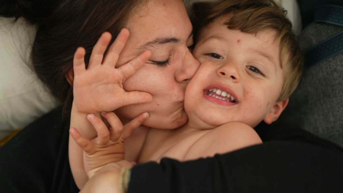 mom kissing her son