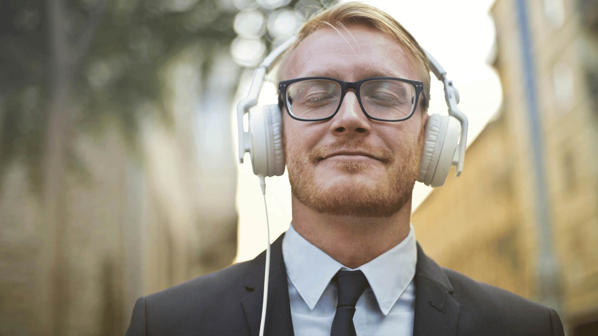 man wearing headphones zoning out