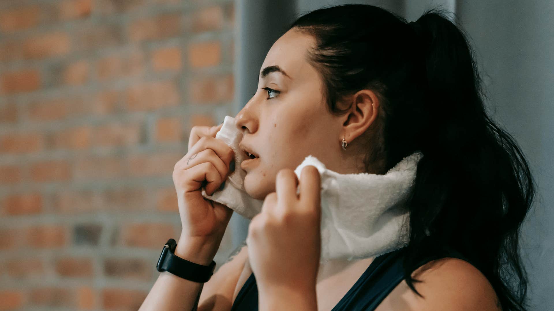woman sweating after workout