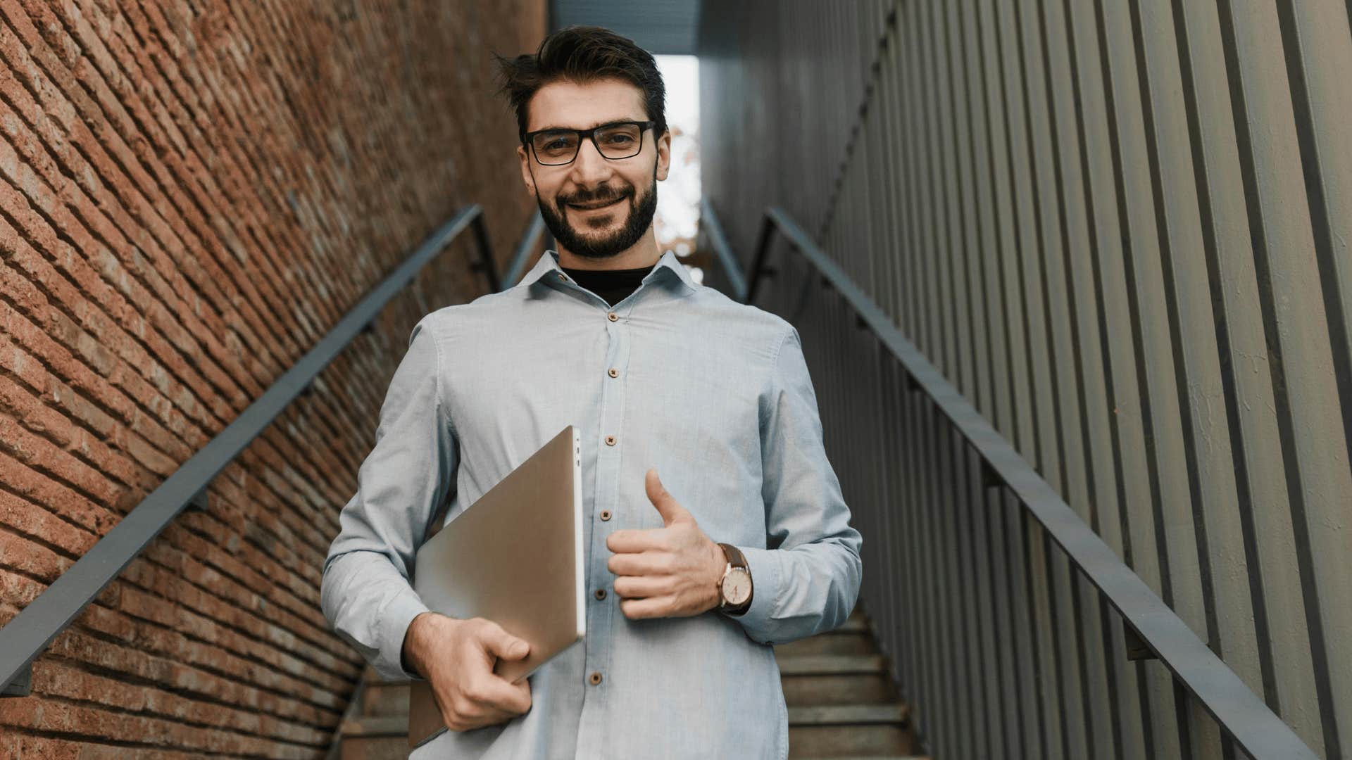 ambitious man in stairwell