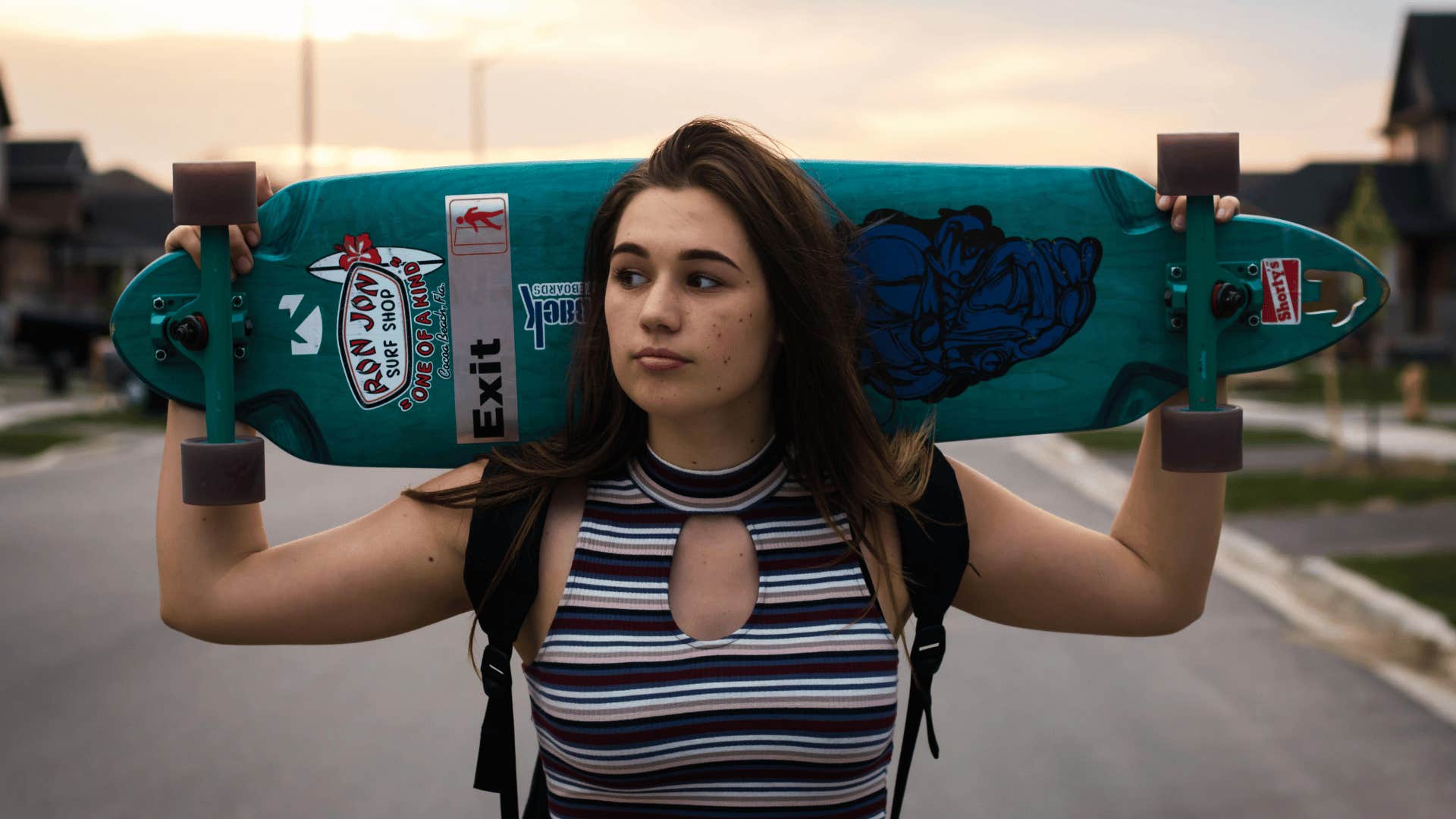 active woman with skateboard