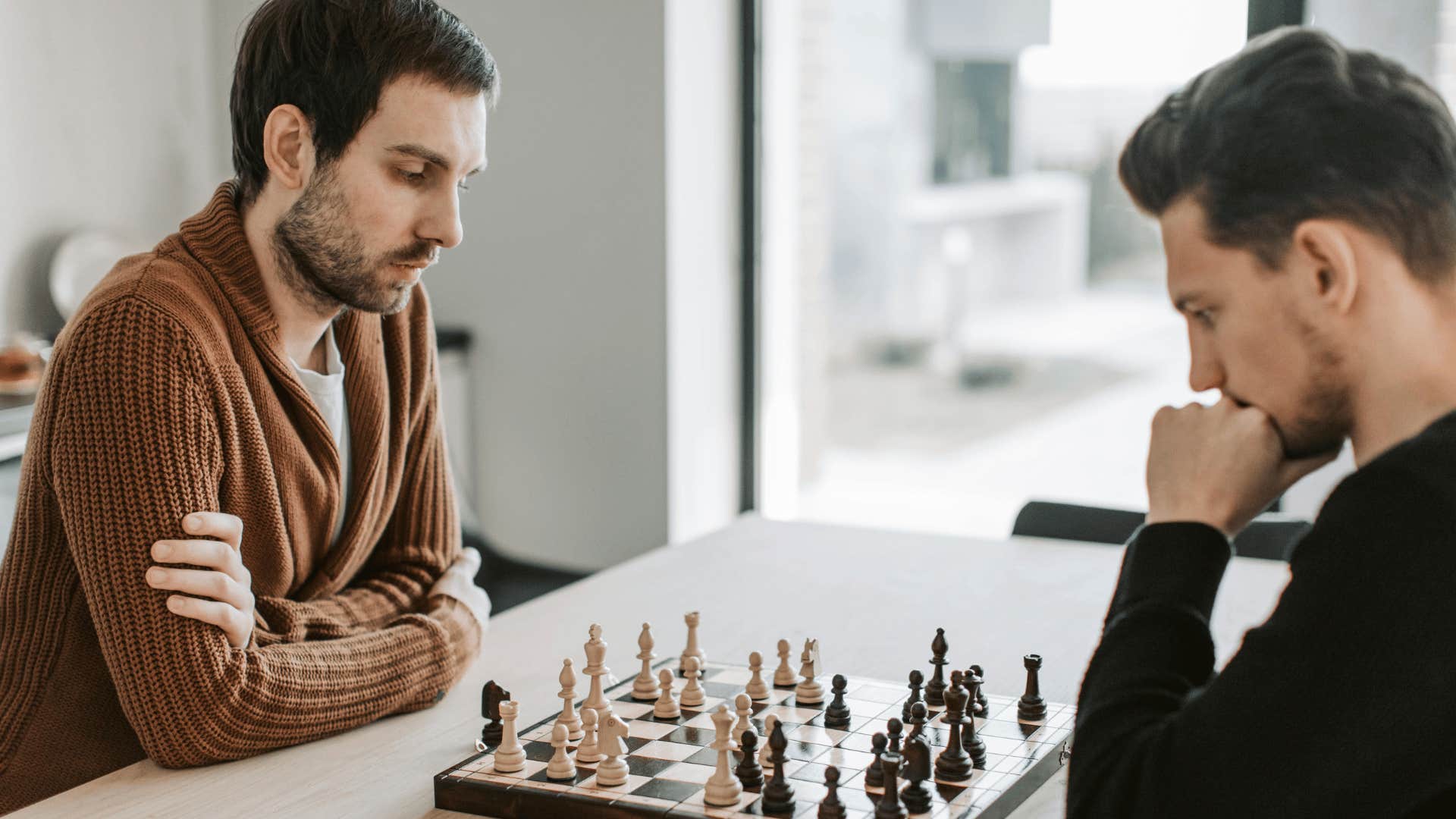 competitive type A friends playing chess