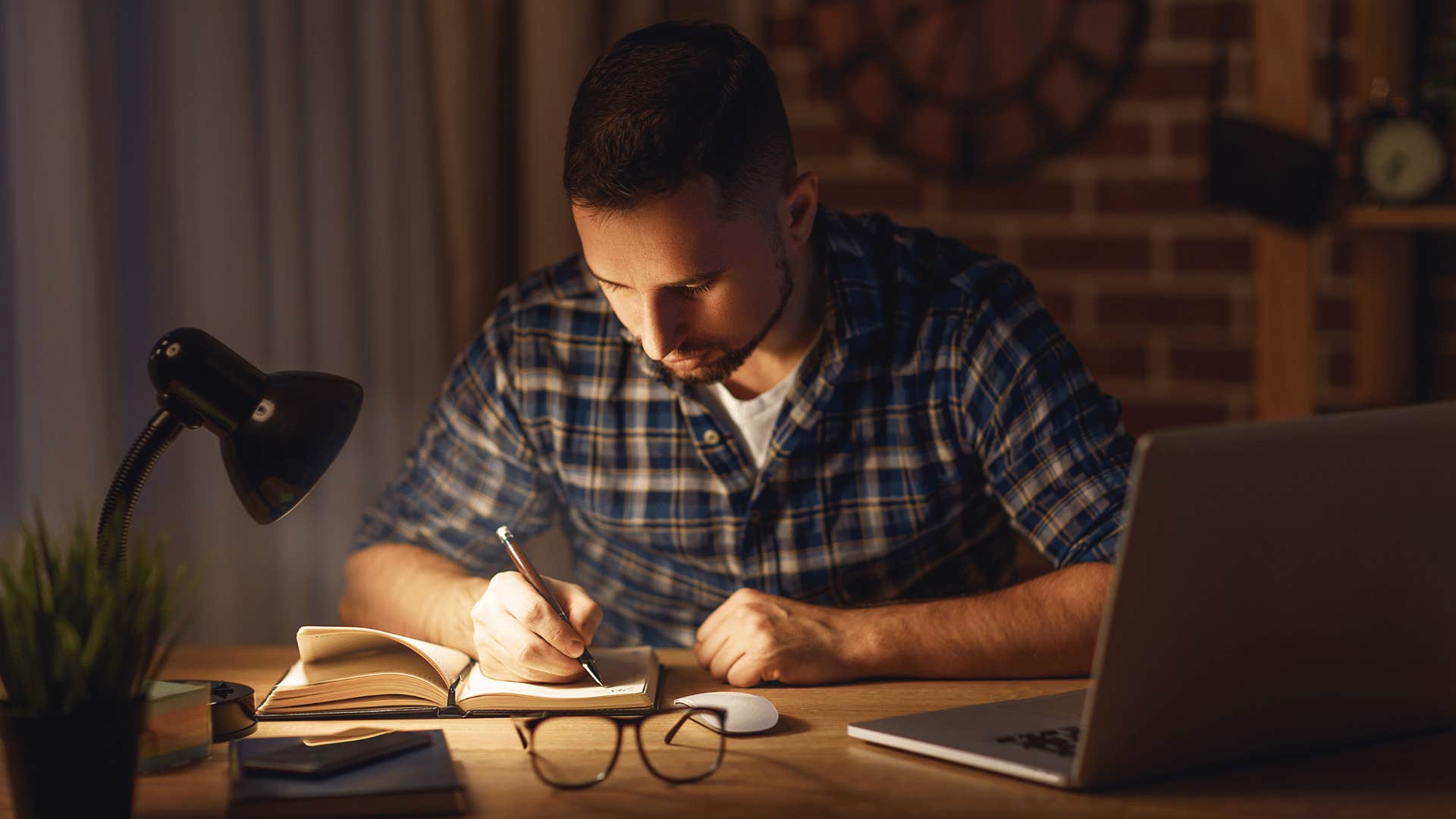 man quietly working late at night