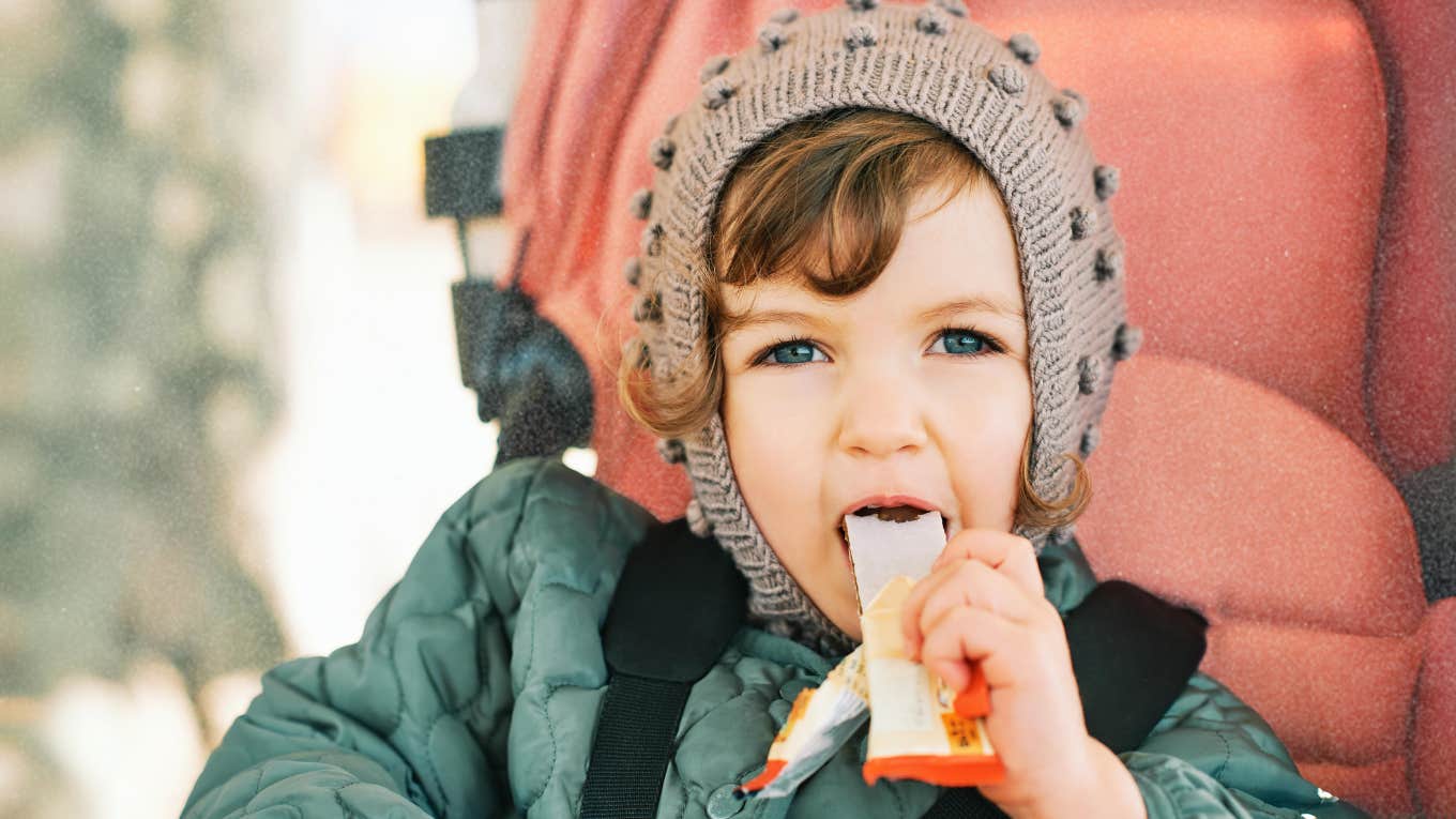 Child eating a healthy snack 