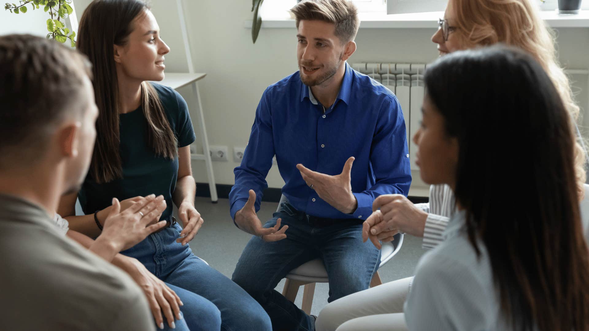 man showing intelligence by actively listening