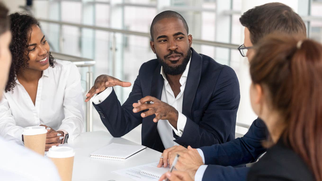 God boss talking to employees