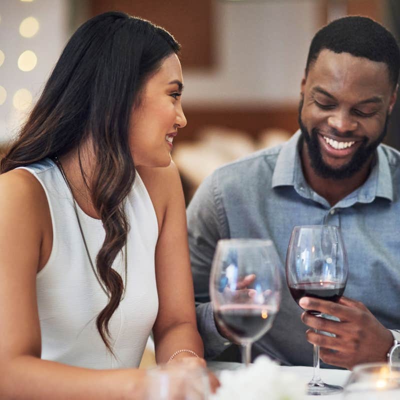 couple drinking wine at restaurant