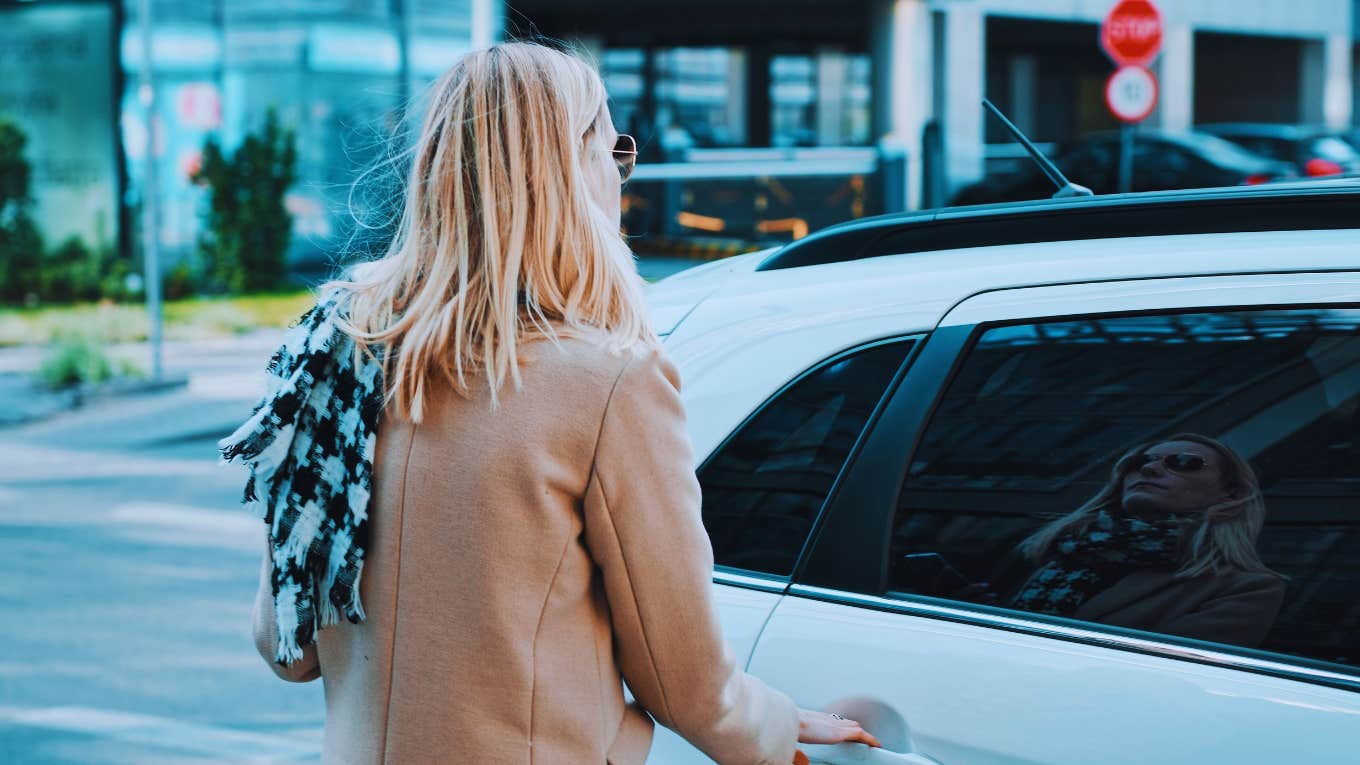 woman getting into an Uber