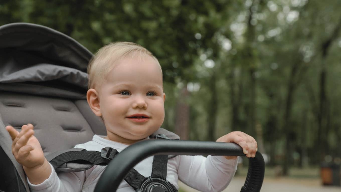 little girl in stroller 