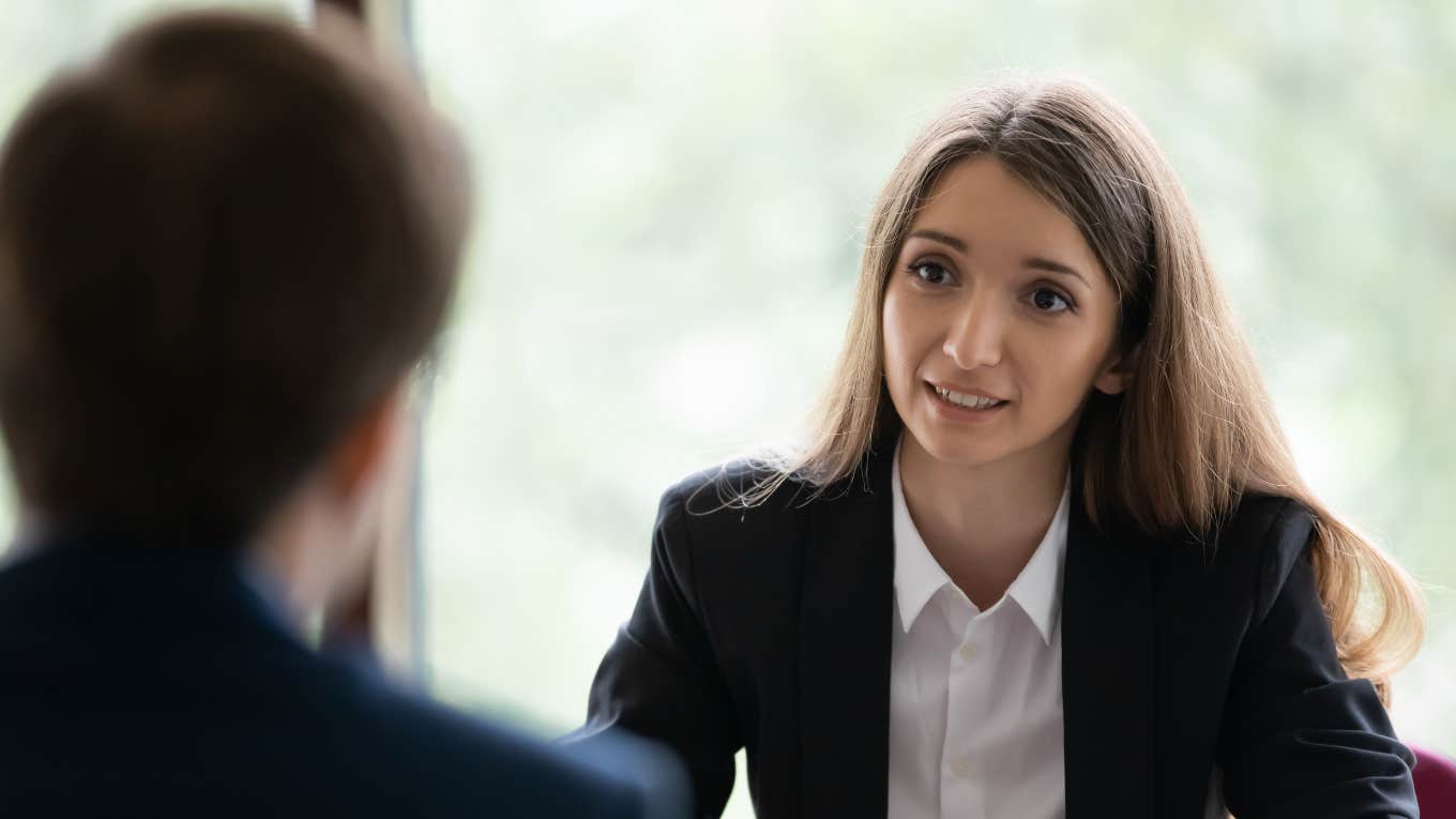 woman being lowballed on salary in a job interview