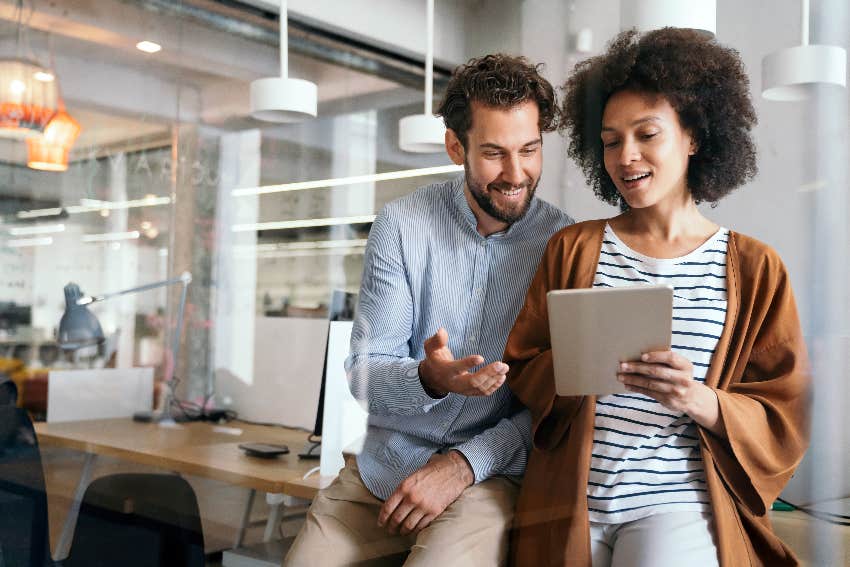 Great manager helping employee in workplace