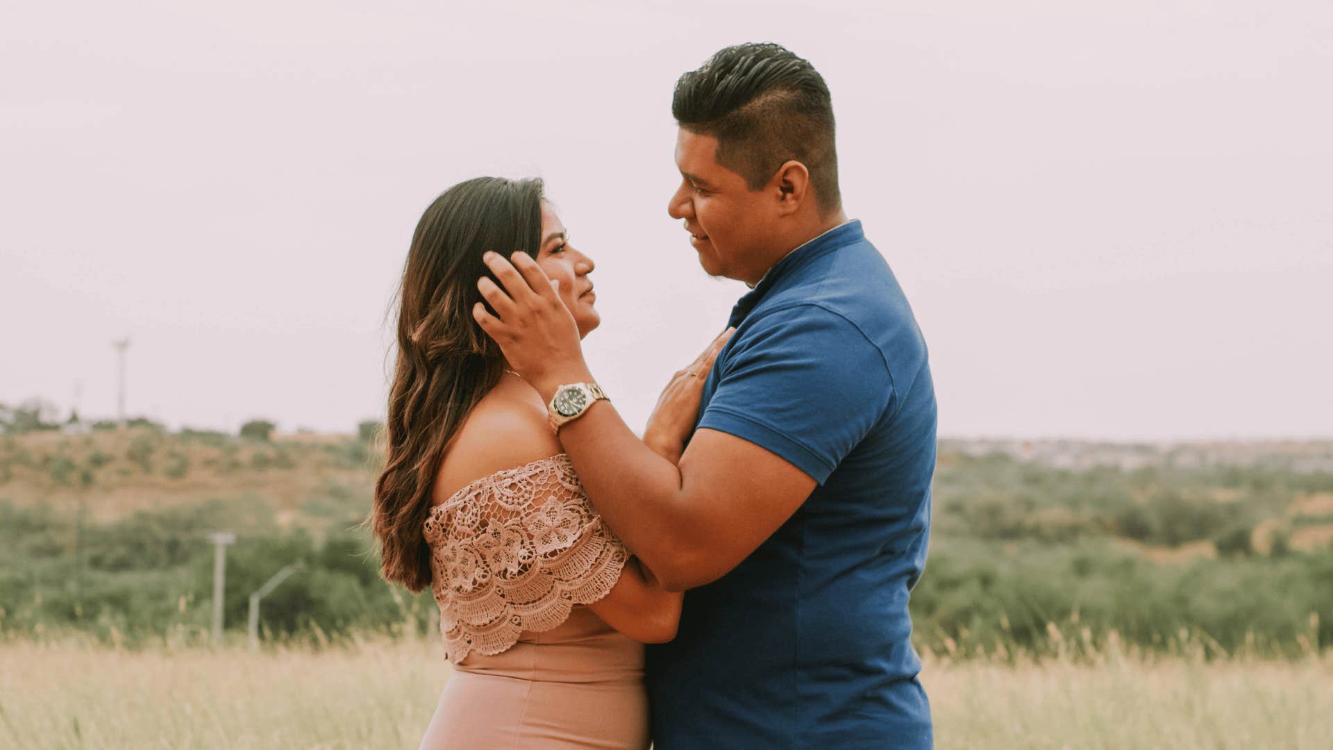 couple standing close together