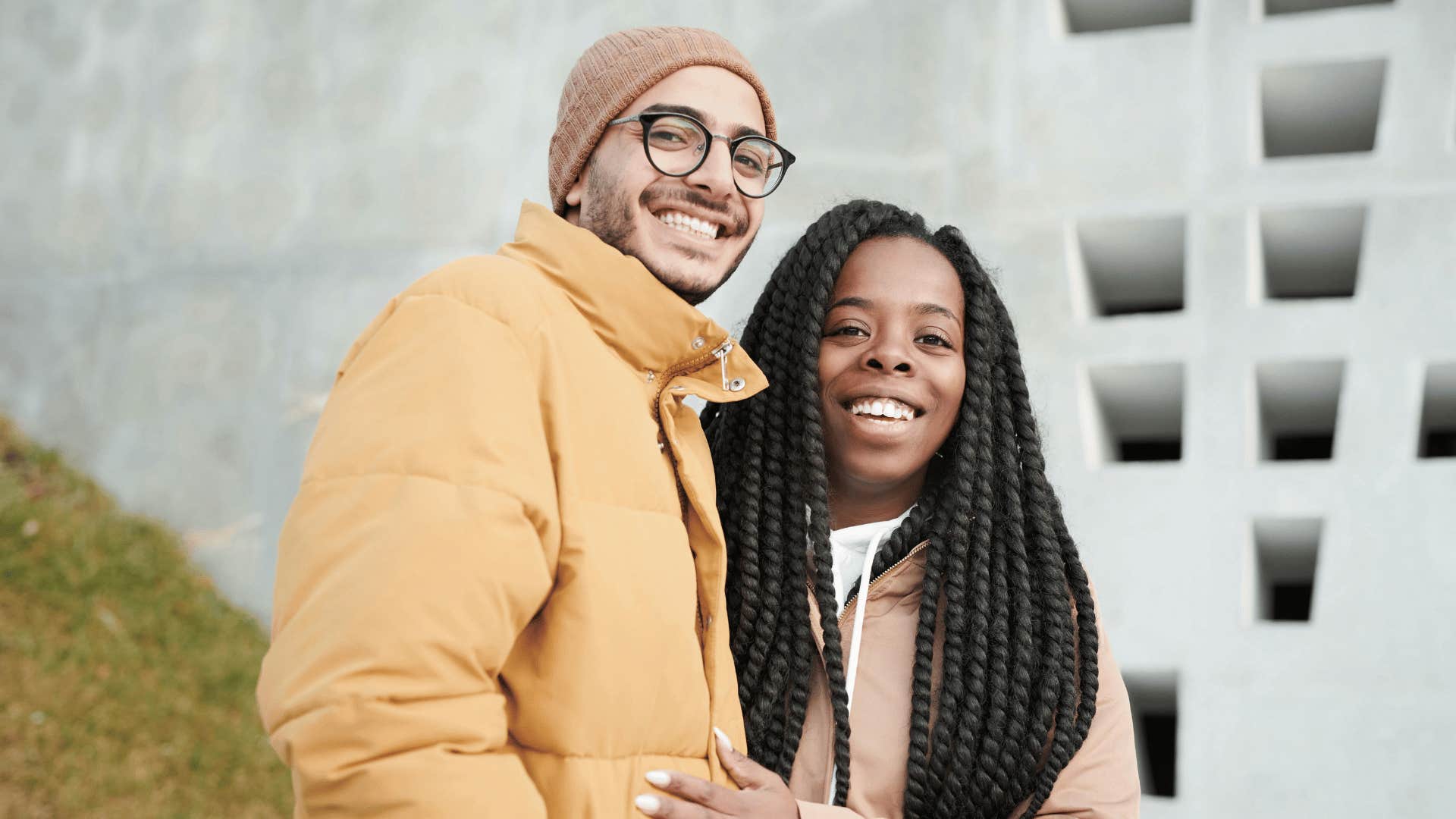 smiling couple standing together