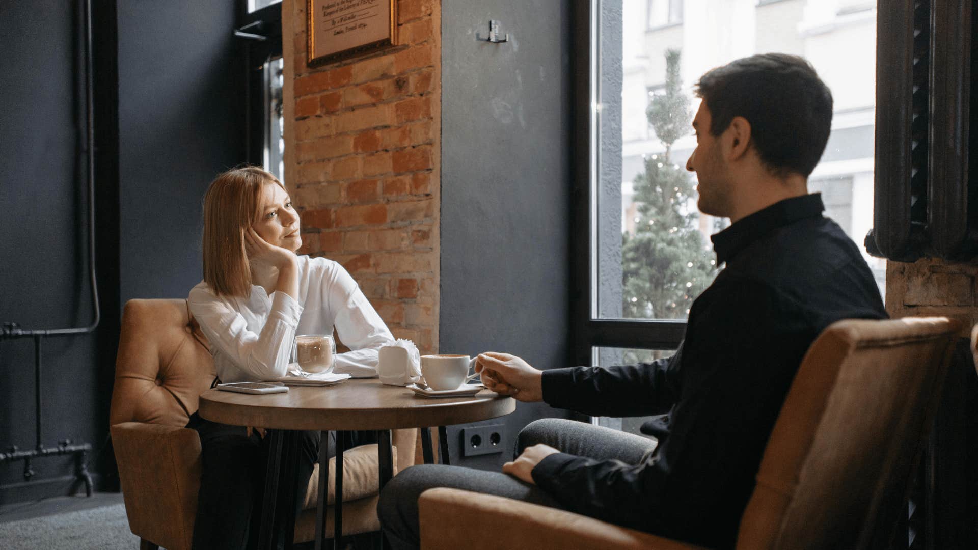 couple sitting in coffee shop