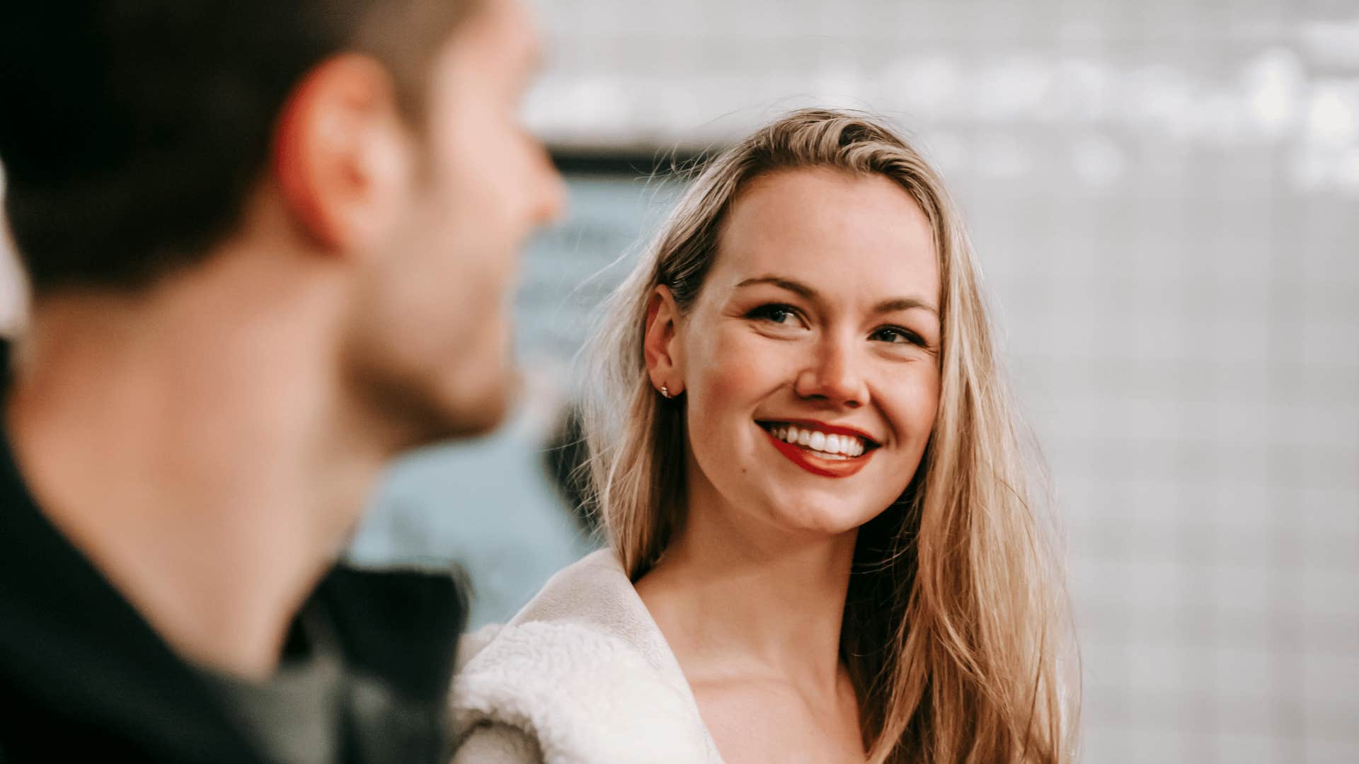 woman smiling at man