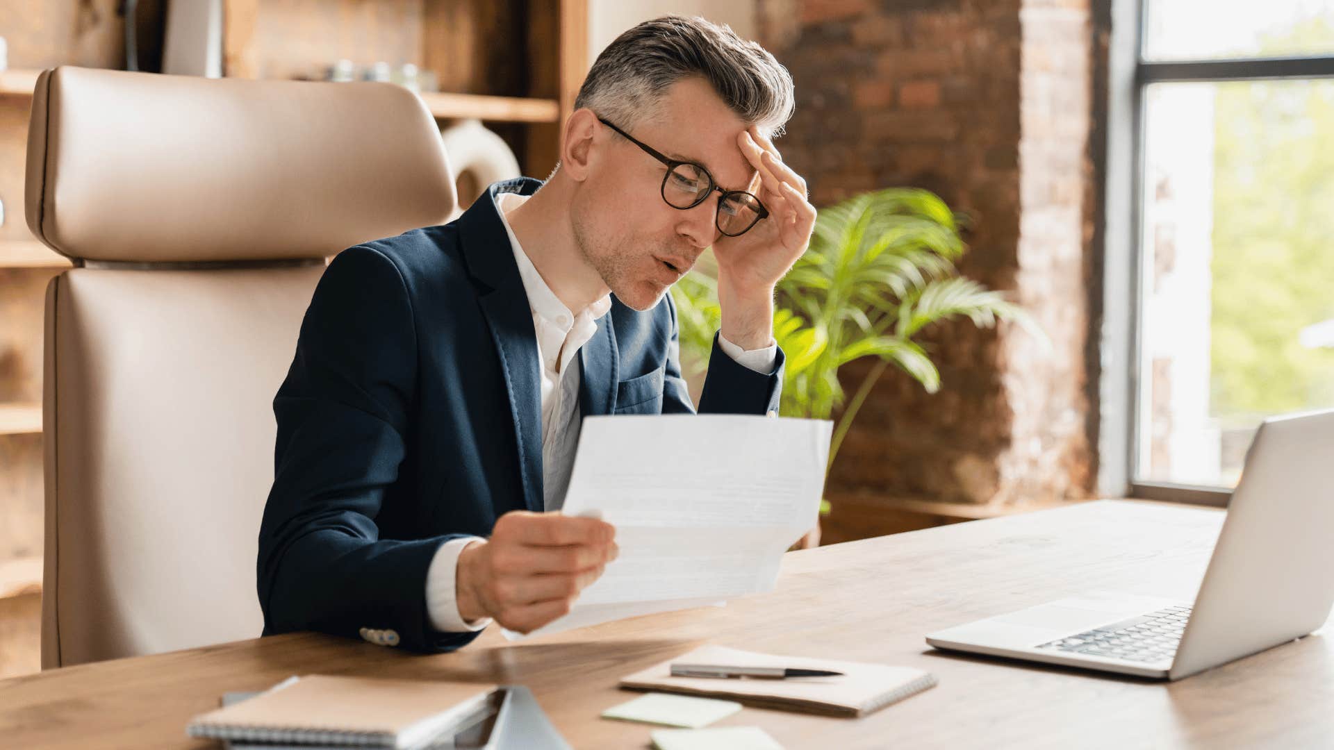 frustrated man at desk 