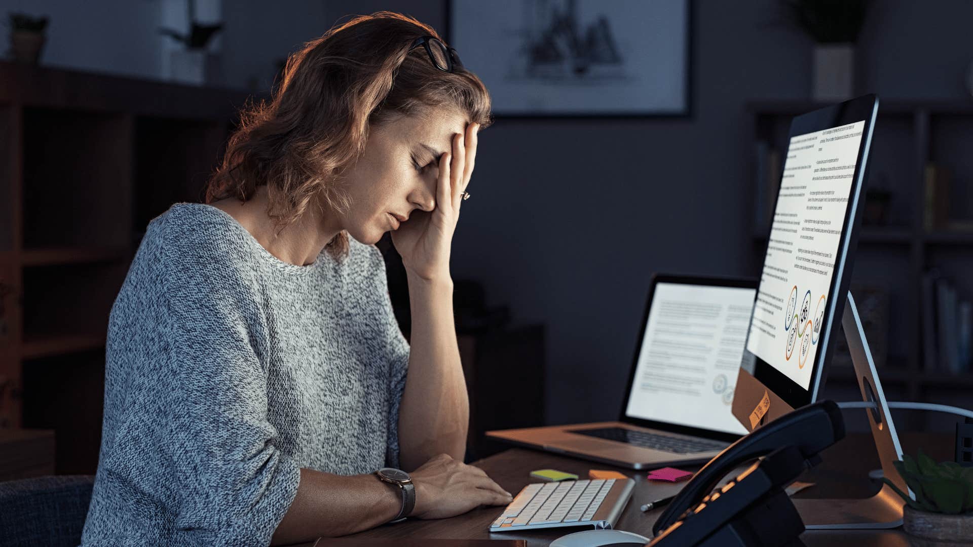 tired employee working late 