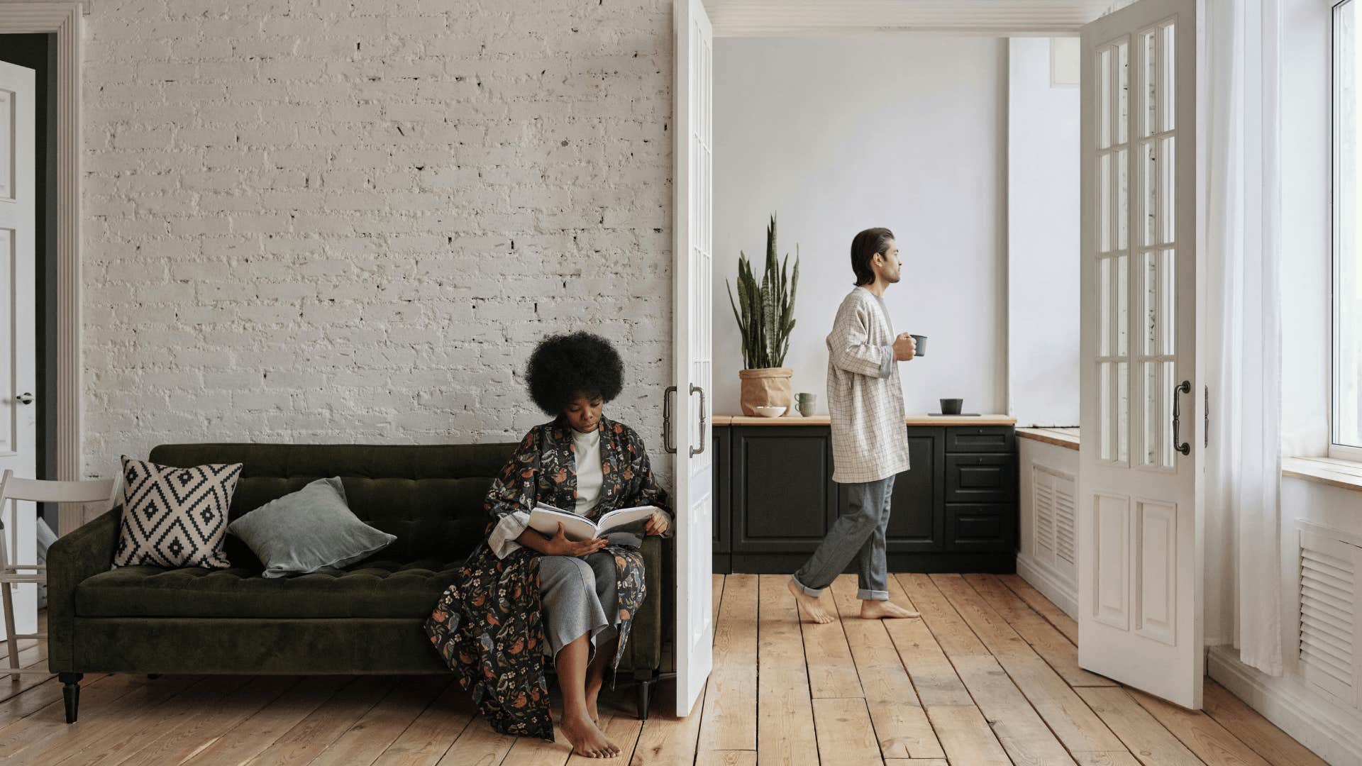 man and woman in different rooms