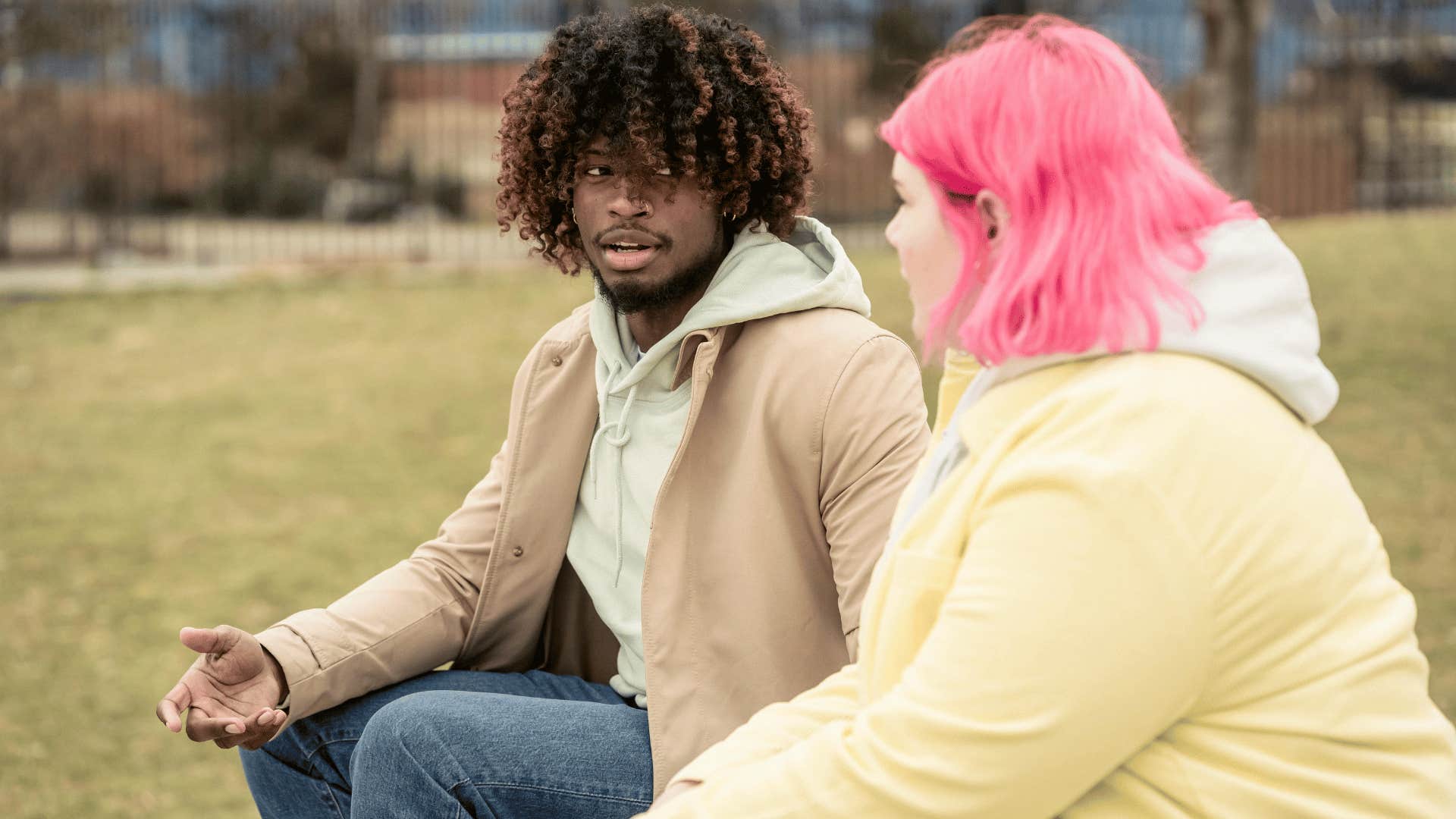 couple having conversation outdoors