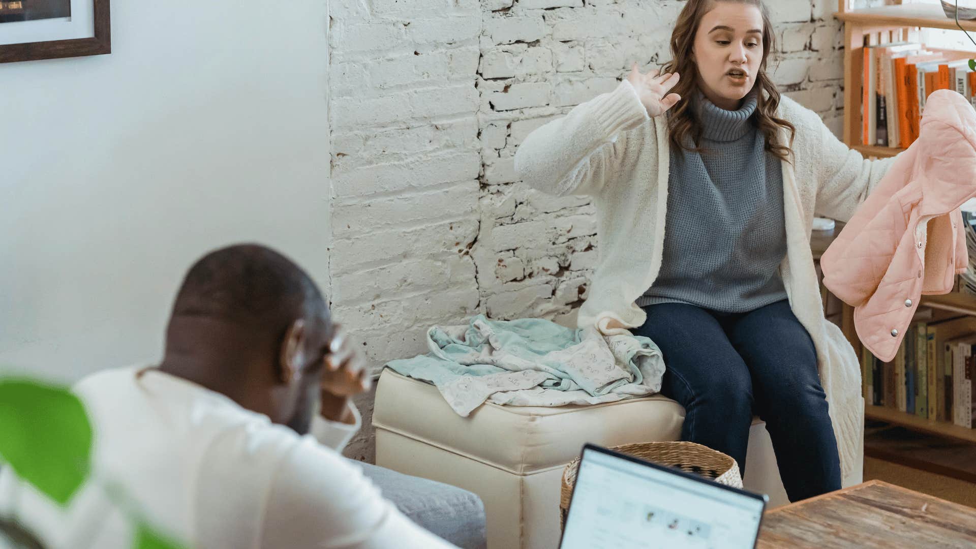 woman speaking aggressively to a man