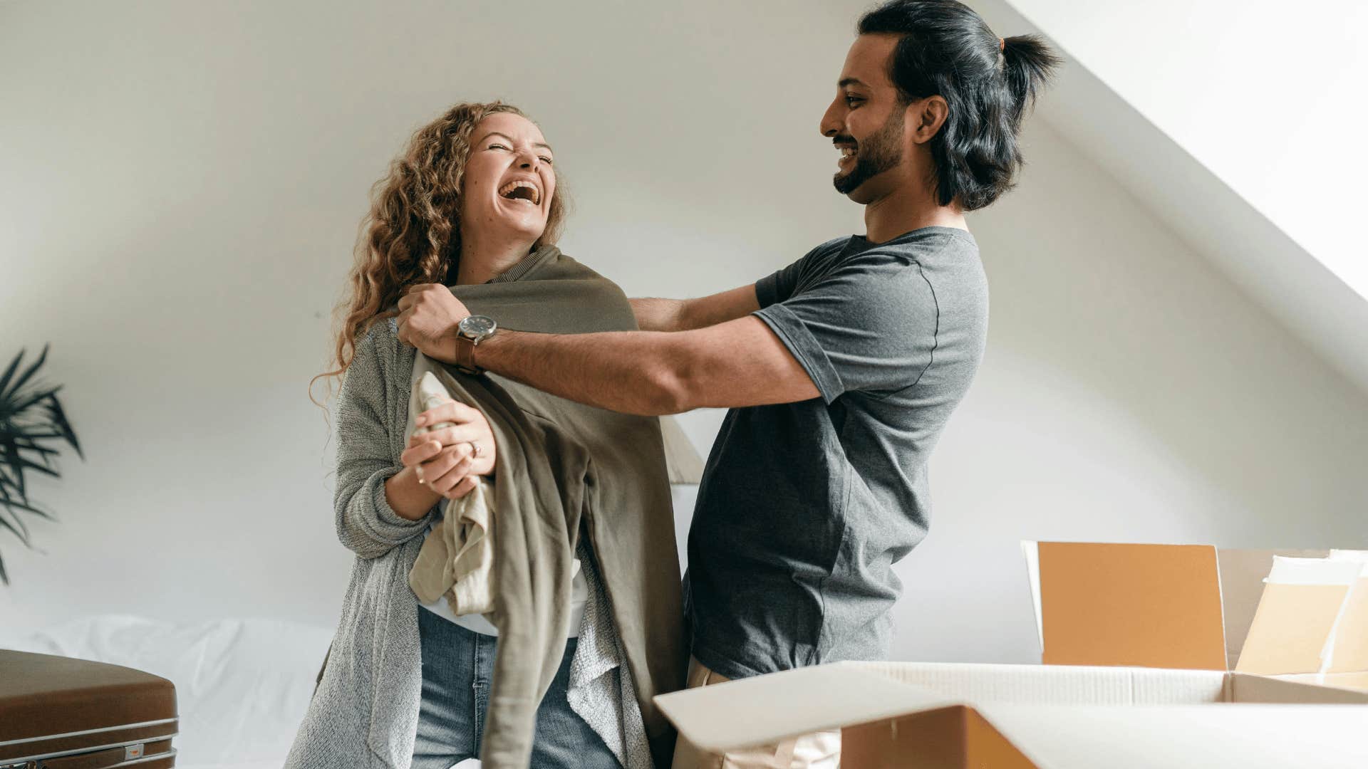 couple laughing together 