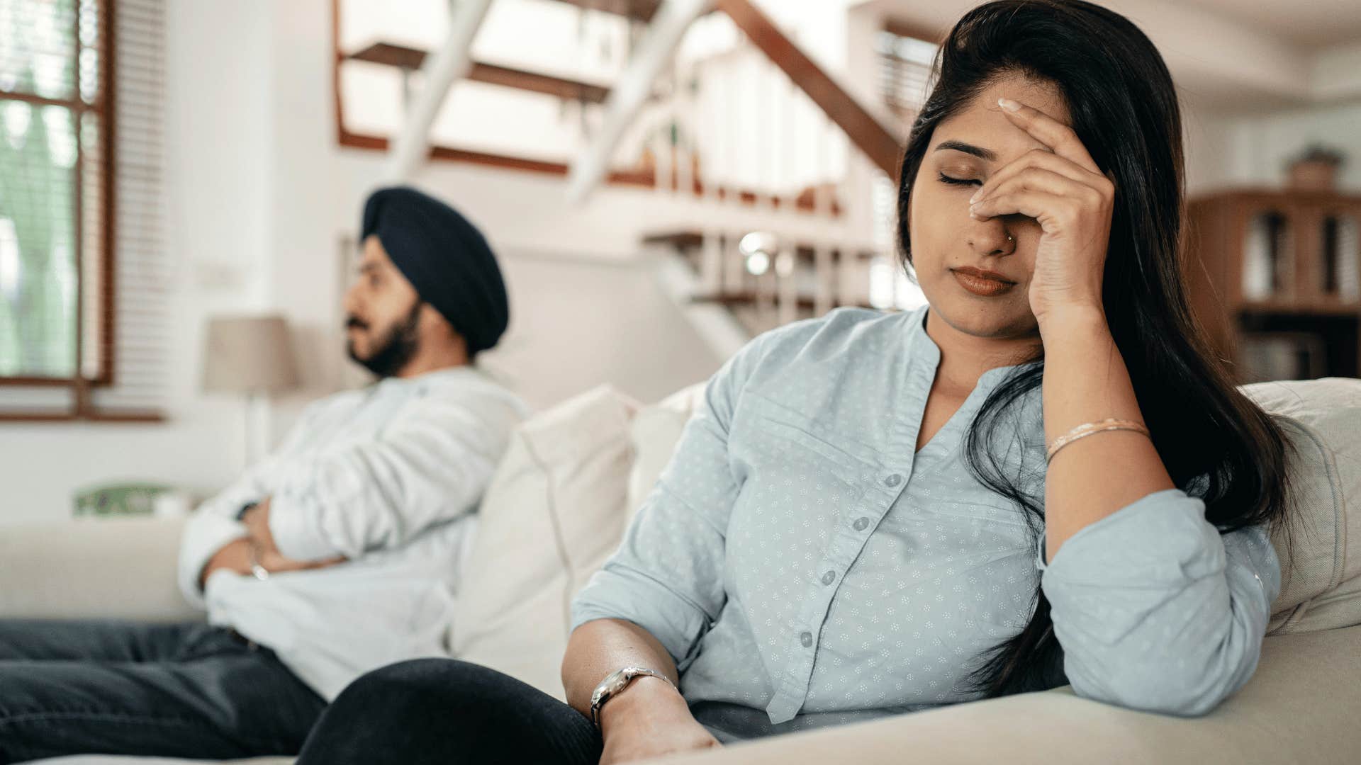 frustrated woman covering face