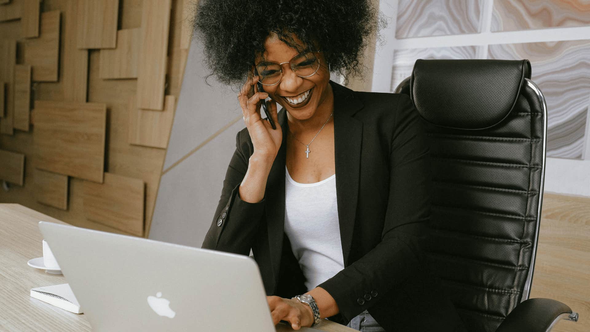 smiling woman on phone