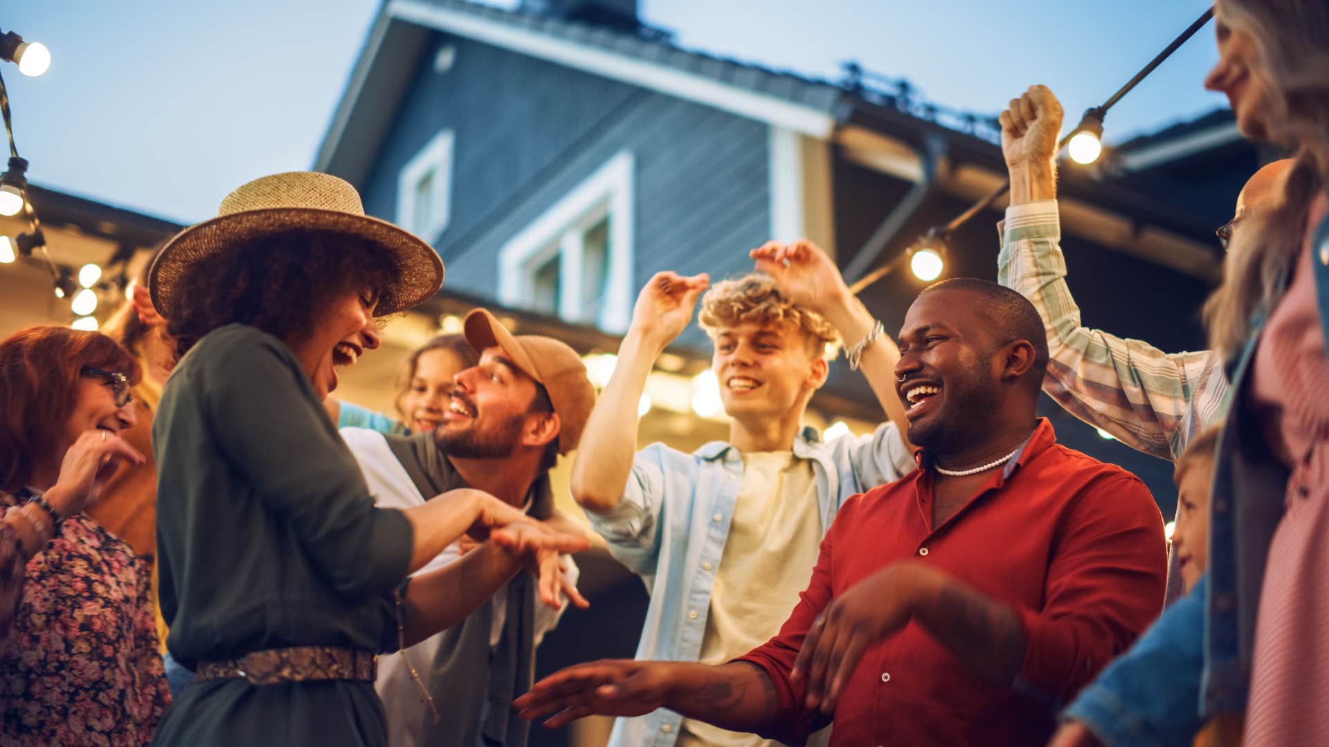 Friends dancing, feeling alive with universe's energy