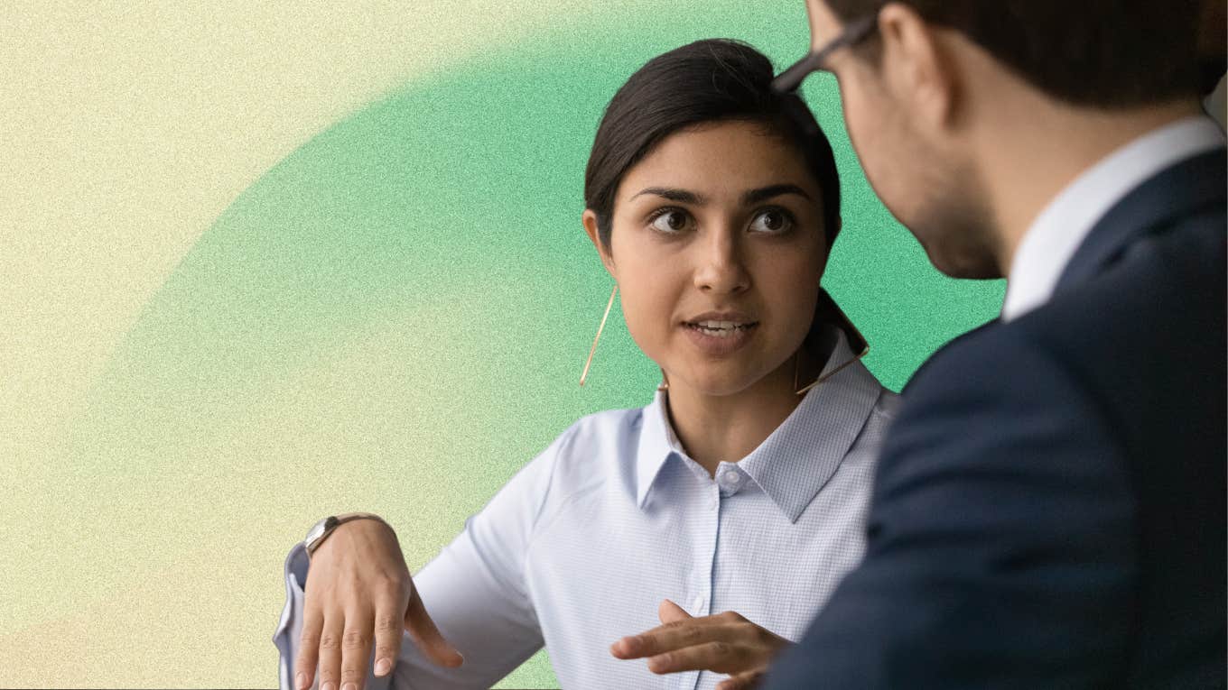 Woman gaining respect from colleague using assertive phrases