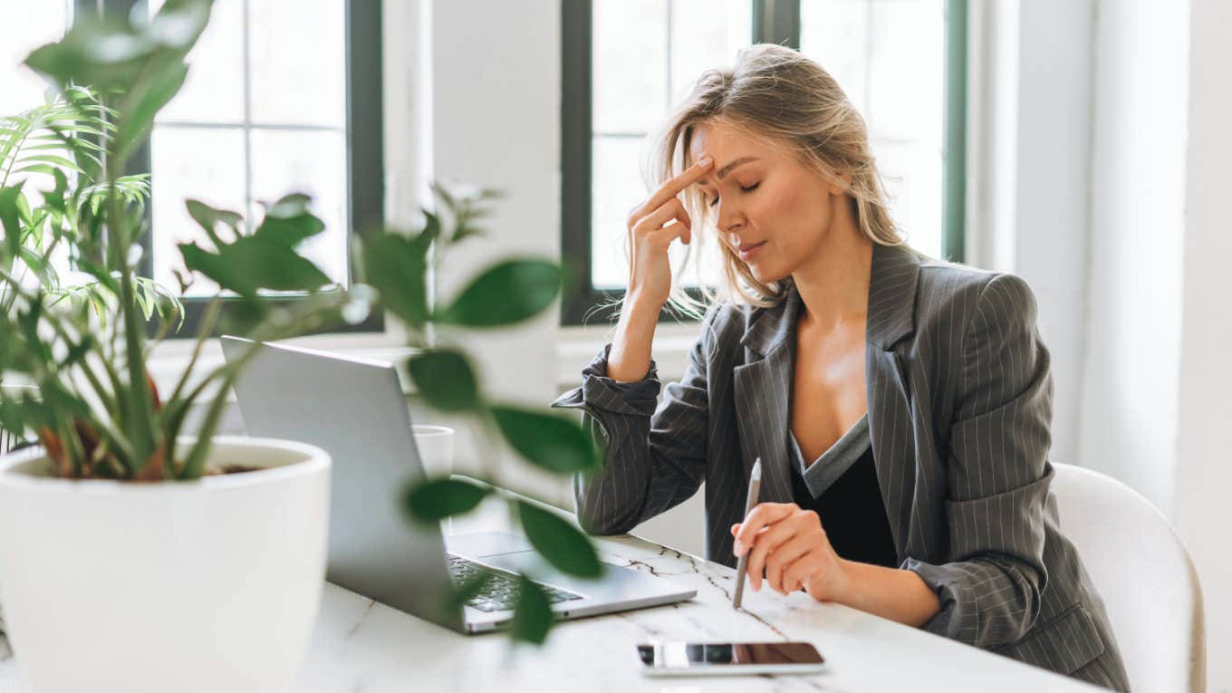 full-time working mom tired and burned out at work office 