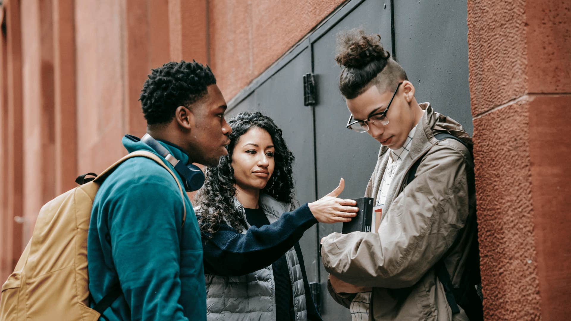 two people judging another person