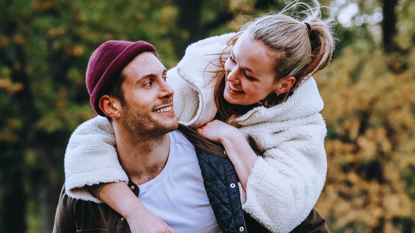 Man displays body language that reveals to his partner he loves her.