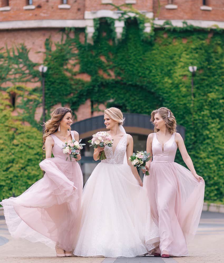 Bride with bridesmaids on wedding day