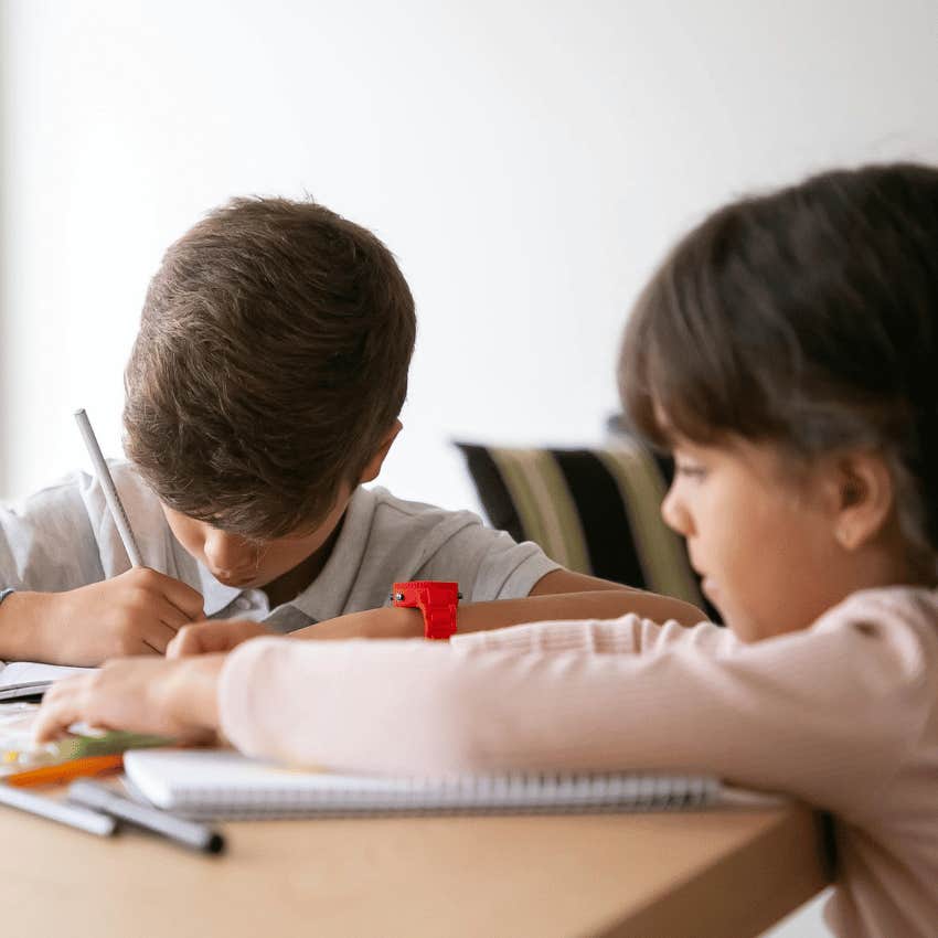 children working on schoolwork