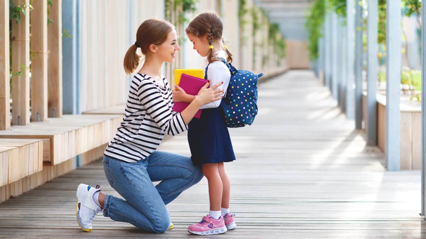 Christian mom indoctrinating her young daughter before school