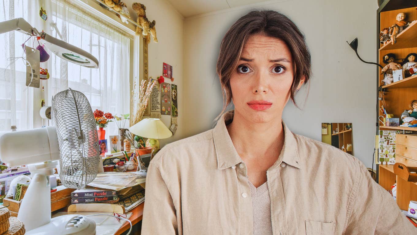 Woman in cluttered house