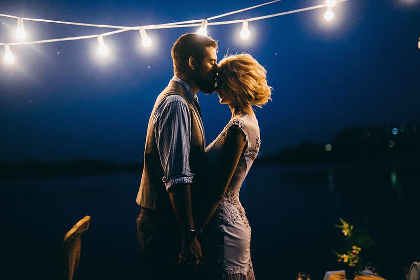 wedding couple near the river at night