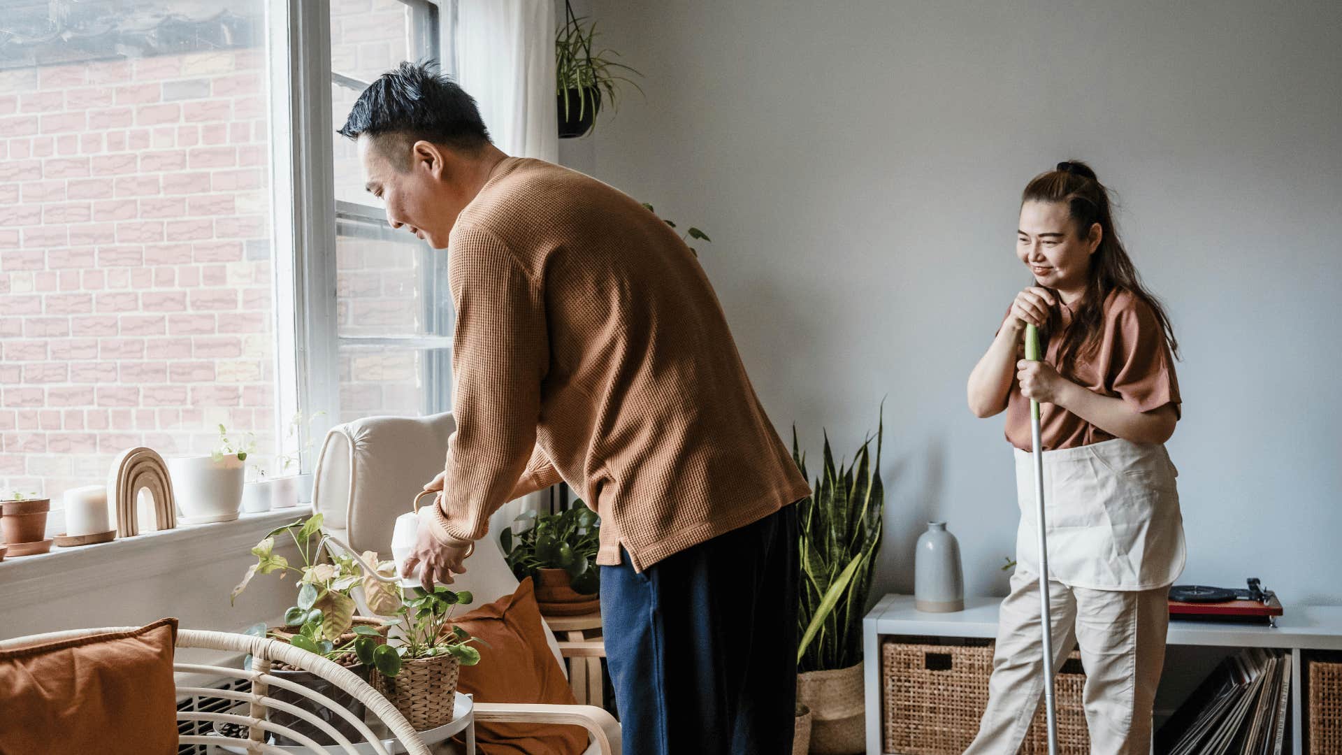 couple doing chores together