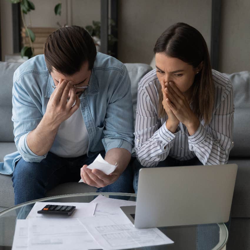 Couple discussing finances after wife lost her job