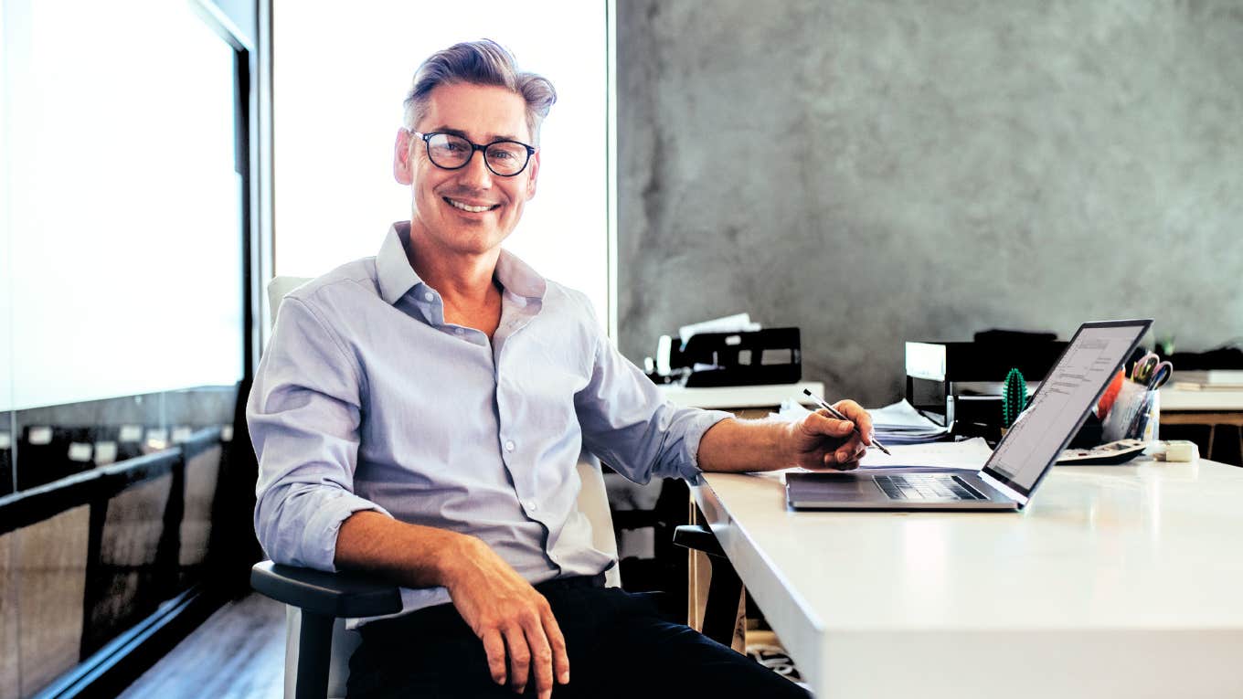 Happy man at new job after quitting without another offer