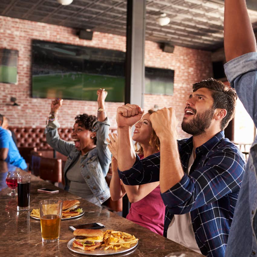 Broke friends eating dinner and watching sports