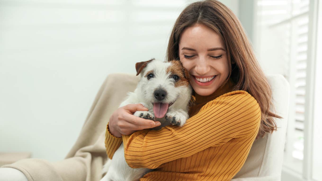 woman hugging her sweet dog