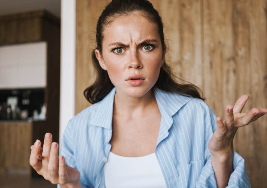 displeased woman complaining at home