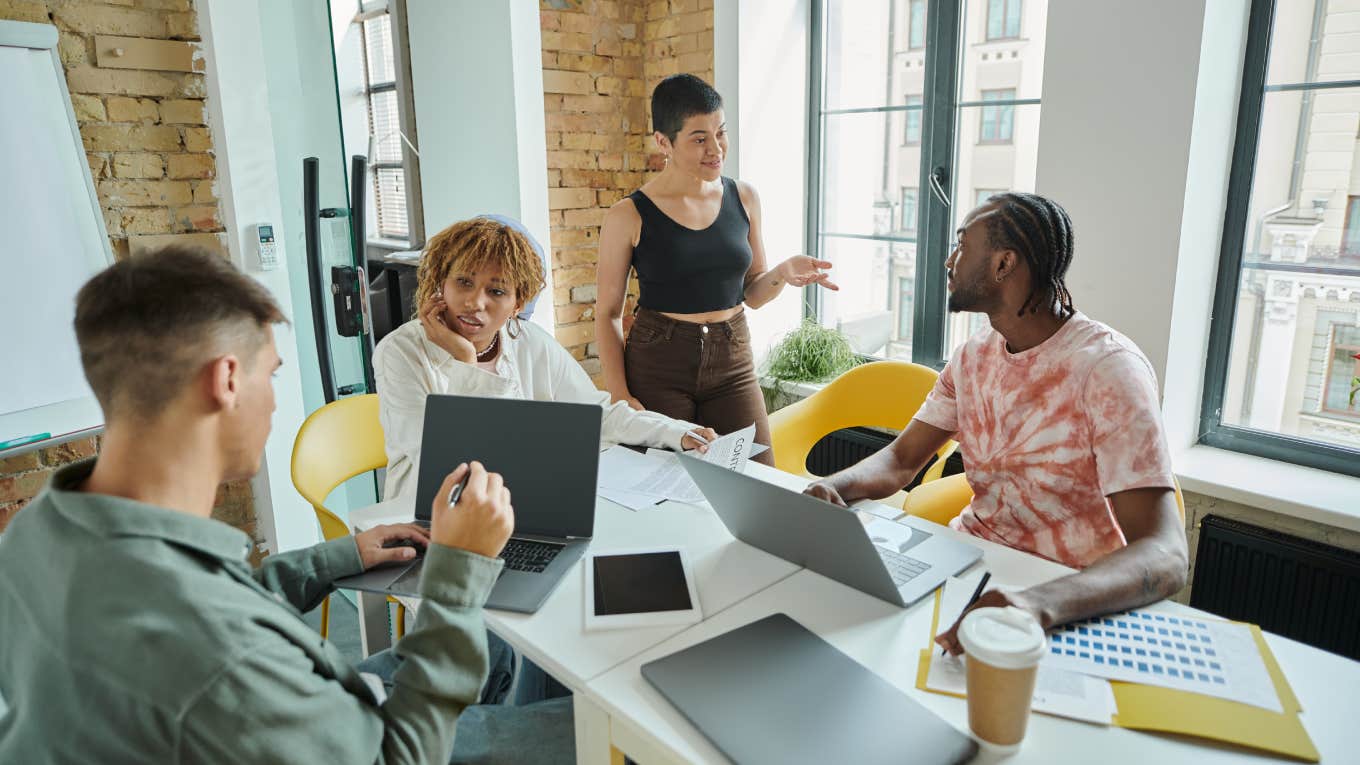 young coworkers together in office space