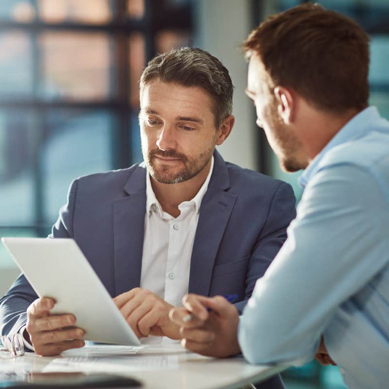 male colleagues having meeting at work