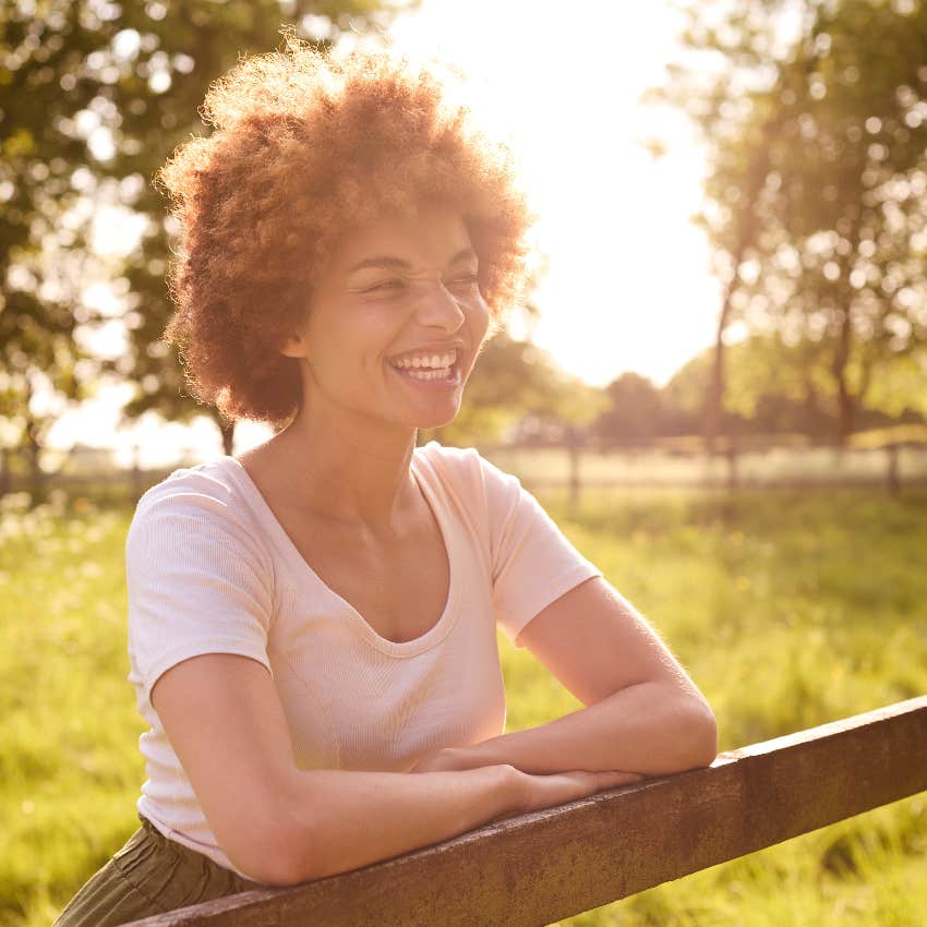 Excited woman getting a message from her intuition